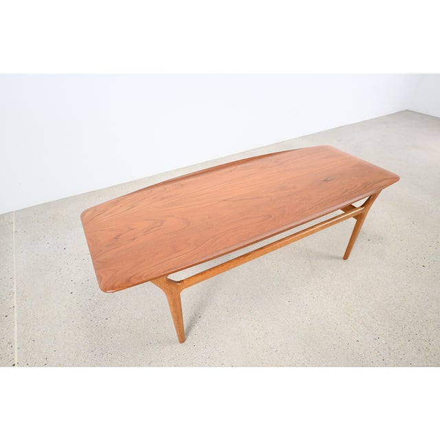 Scandinavian teak coffee table designed by Kurt Østervig for Jason Møbler, Denmark, circa 1960s. Featuring sculptural...