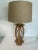 Beautiful rattan lamp will add a nice tropical feel to any interior. Has great twist detail between a thick faux bamboo...