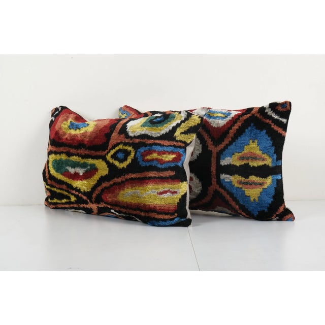 Decorative Throw Velvet Ikat Pillow -Luxurious cushion cover of handloomed ikat fabric -Insert is NOT included -Ikat is an...