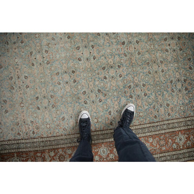 :: Allover covered field in a Herati design motif wrapped by an alternating inverted turtle samovar design motif main...