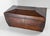 We are selling this mahogany veneered English Regency sarcophagus form tea caddy. This nice tea caddy has simple form with...
