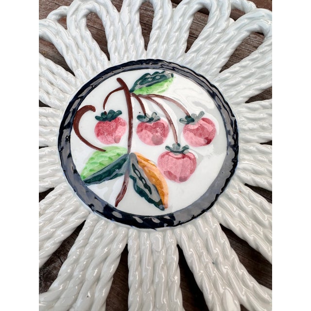Vintage Hand painted ceramic plate. Made in Spain Mid-20th century. Reticulated ceramic braided by hand around lovely...