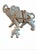 This elegant set of two porcelain elephant figurines features a larger and a smaller elephant, both adorned with intricate...