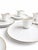 Elegant vintage porcelain dinnerware set originally retailed by Saks Fifth Avenue. This sophisticated Japanese-made set...