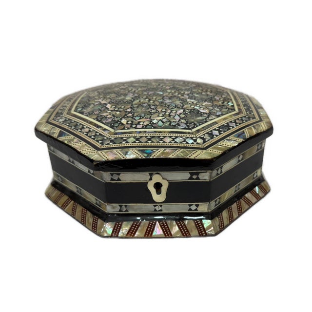 Bring timeless elegance into your home with this Handmade Octagonal Mother of Pearl Jewelry Box, carefully handcrafted by...