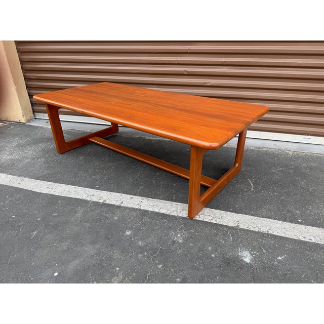 Vintage Danish made all solid wood teak coffee table. This unmarked table likely dates to the 1970's has been completely...