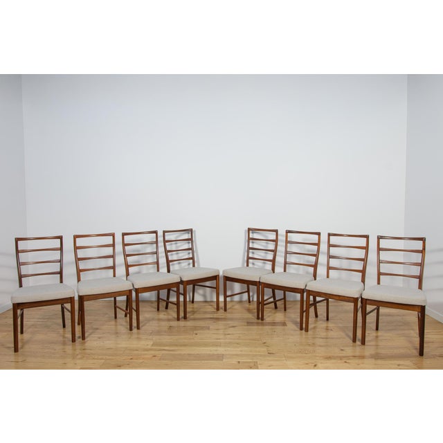 A set of eight chairs manufactured by the British McIntosh manufacturer in the 1960s. These classic chairs have an...