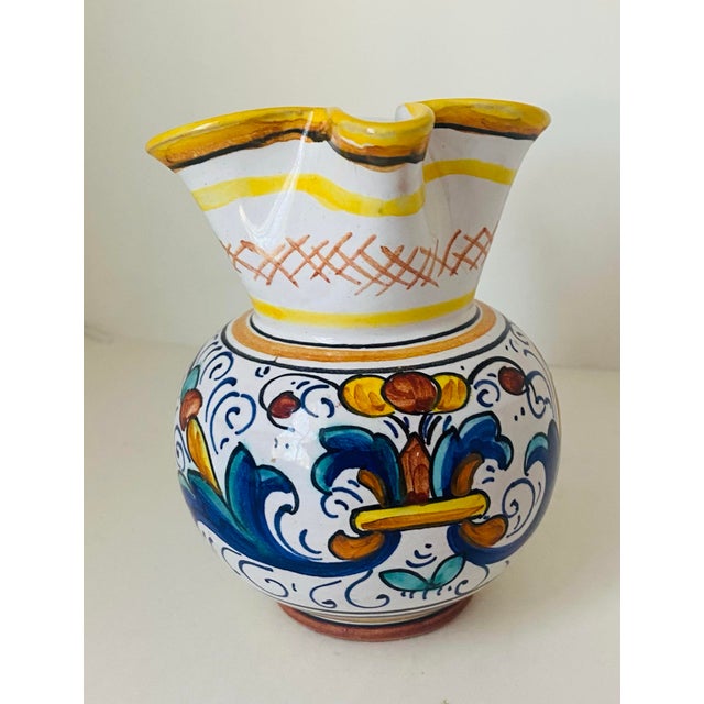 This is a small hand painted Ricco Deruta majolica pitcher or creamer made in Deruta, Italy in the late 1970s - early 80s....
