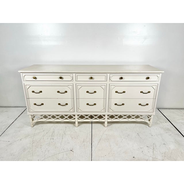 Vintage Ficks Reed Rattan Dresser. 9 drawer long dresser, solid wood construction with rattan trim. Woven pencil reed trim...