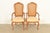 A gorgeous pair of French Provincial Louis XV style armchairs or dining chairs By Thomasville USA, Circa 1960s Sculpted...