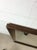 This mid century modern mirror features long rectangular hardwood frame, original walnut finish, and vintage mirrored glass.