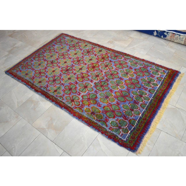 Dimension: 58" x 101" or 4'10" x 8'5" and 1 in thick Material: made of wool on cotton and natural dyes Condition: Turkish...