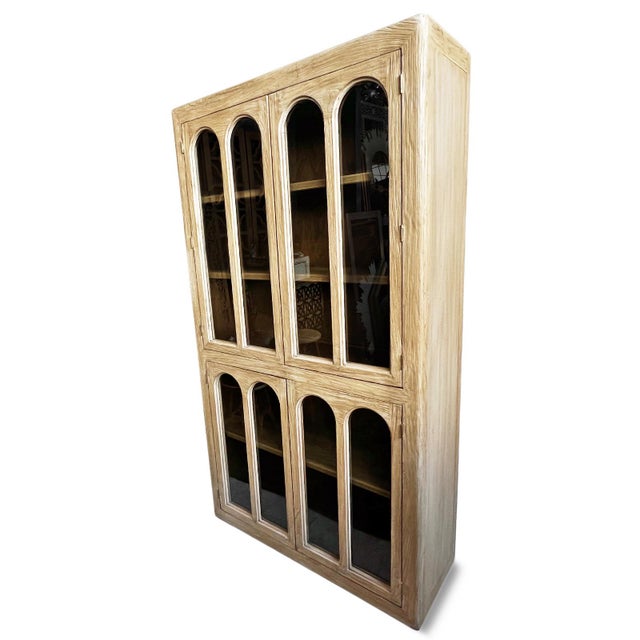 Vintage beautiful natural salvaged elm wood display cabinet with arched windows on four doors. Interior features removable...