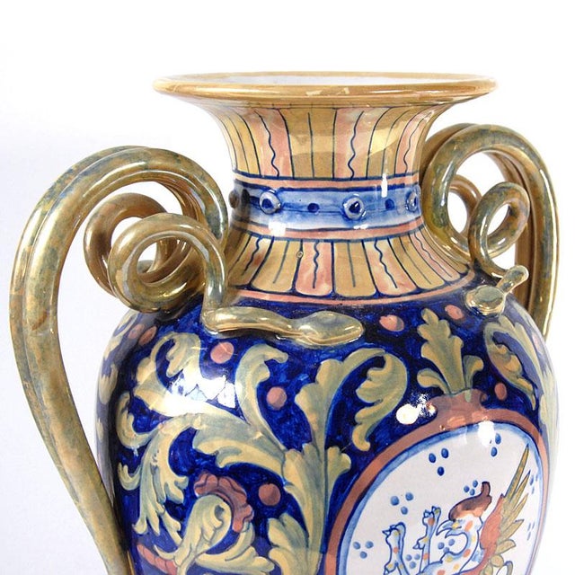 A beautiful glazed majolica vase in the Renaissance style. Hand-decorated. The glaze has a slightly opalescent sheen. It...