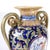 A beautiful glazed majolica vase in the Renaissance style. Hand-decorated. The glaze has a slightly opalescent sheen. It...