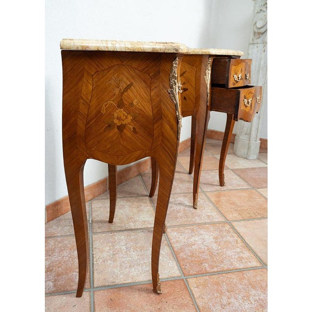 Pair of finely inlaid French nightstands with Verona yellow marble tops, 20th century. General Condition: Restored by our...