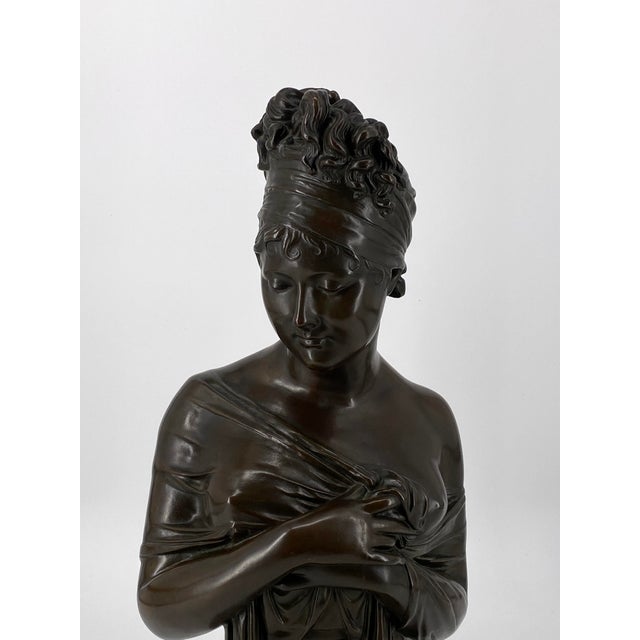 A bust * Madame Récamier bust on a red marble base * Julie / Juliette Récamier * Cast in bronze bust * by J. Petermann...