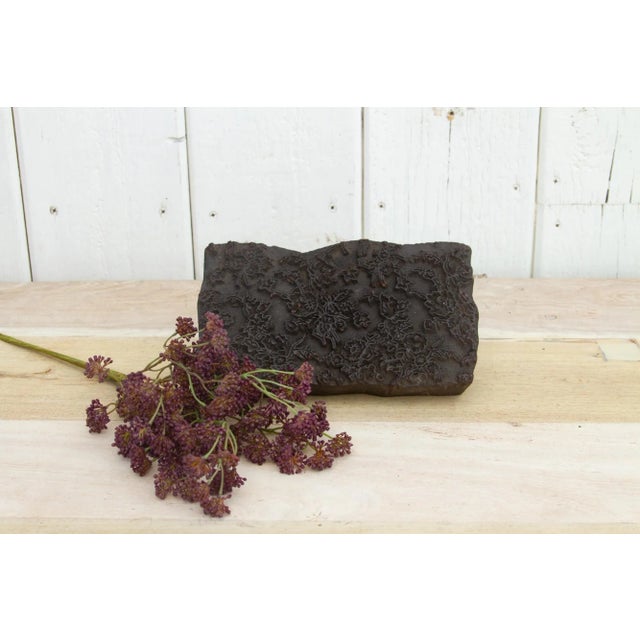 A vintage wooden printing block from India, it is hand-chiseled by artisans and its used to hand print textiles. It...