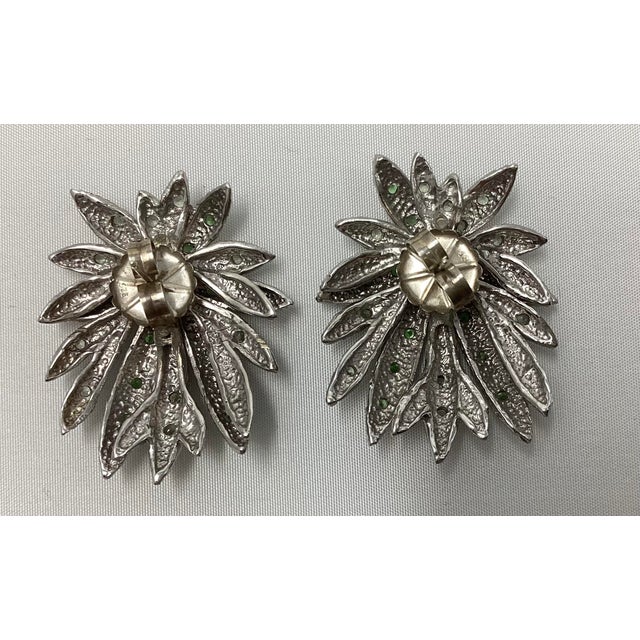 Lightweight, Easy to wear, these earrings are beautiful. They have friction posts with large backs. Sterling silver and...