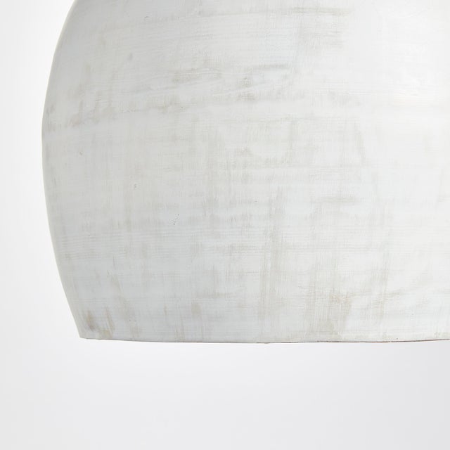 This modern pendant strikes the perfect balance. TheWhite matte wash is decidedly tranquil, while theGolden interior...