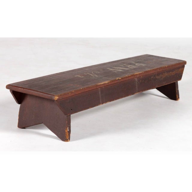 Wonderful mid-19th-century American folk art prayer kneeling bench or low pew stool retaining its original dark red-brown...