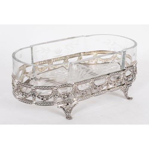 An elegant hartmonised pair of Louis revival silver plated cut crystal centrepieces Circa 1860 in date. These centrepieces...