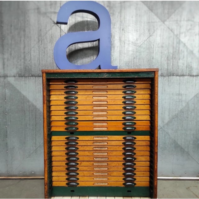 This authentic printer’s type cabinet spent years in a traditional print shop, storing lead type letters. Now, it’s ready...