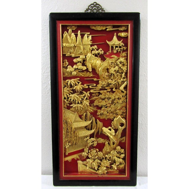 Pair Chinese Black Lacquer Painted and Carved Gold Giltwood Wall Hanging Panels These elaborate and deeply carved panels...
