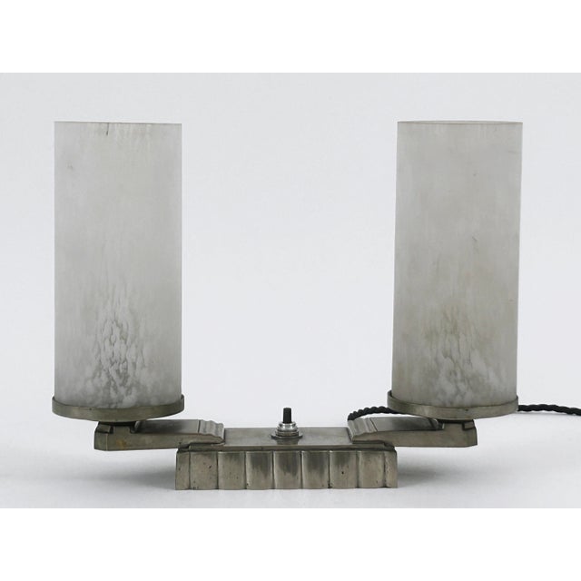 Monumental and very elegant art deco table lamp or desk light. Designed & manufactured in france, 1920s. We found under...