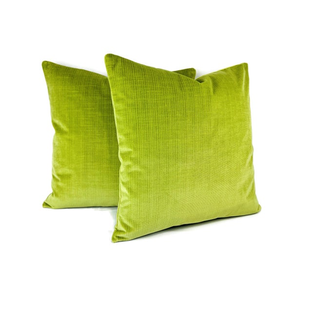From Schumacher is Antique Strie Velvet in the color Lime pillow cover. This pillow features a vibrant apple green color...