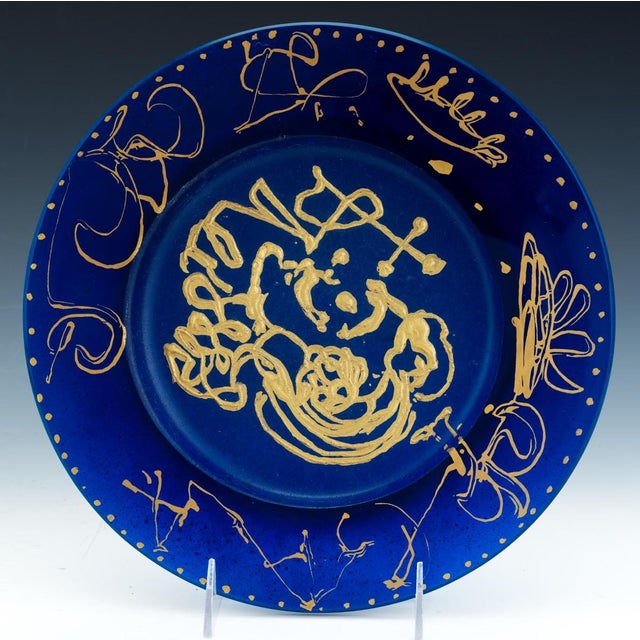 A striking and highly collectible Salvador Dalí for Daum pâte de verre art-glass plate, created as part of the celebrated...