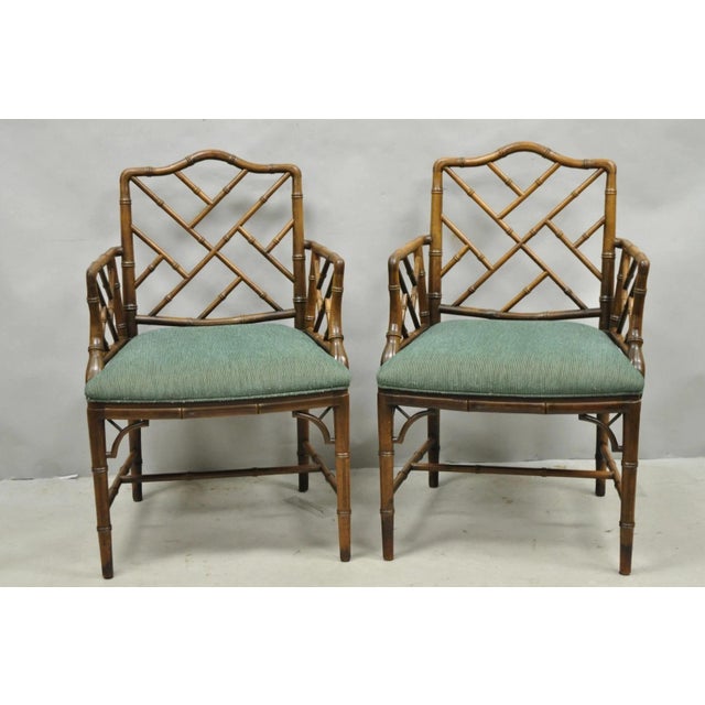 Vintage Chinese Chippendale Faux Bamboo Wood Fretwork Hollywood Regency Dining Arm Chairs - a Pair. Circa Mid 20th...