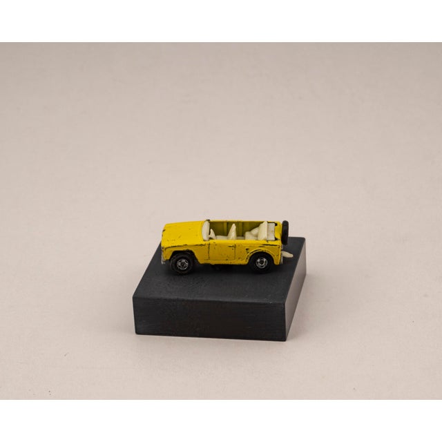 Original vintage die cast model of the Field Car from Matchbox, Series No. 18, mounted on a solid marble base. A unique,...