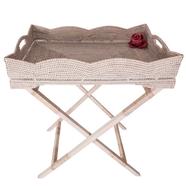 Infuse your home with the perfect blend of style and functionality with the Scallop Design Butler Tray with Wooden Legs....