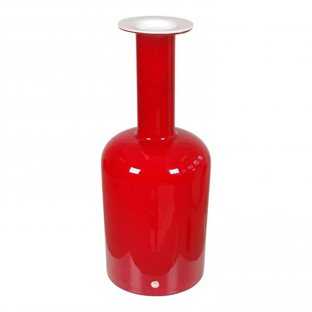 Otto Brauer/Holmegaard red glass vase. H: 51 , D: 19. No defects.