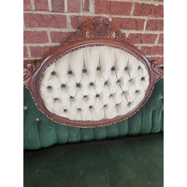 Very Nice French Victorian Era Sofa. Very nice large sweeping wings with stylized design. It has newer upholstery. Has a...