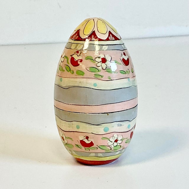 In the style of Russia’s hand-carved wooden nesting dolls, we have an Easter Egg. It was originally probably part of a...
