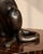 This imposing animal sculpture in genuine bronze is distinguished by its original and particularly expressive pose....
