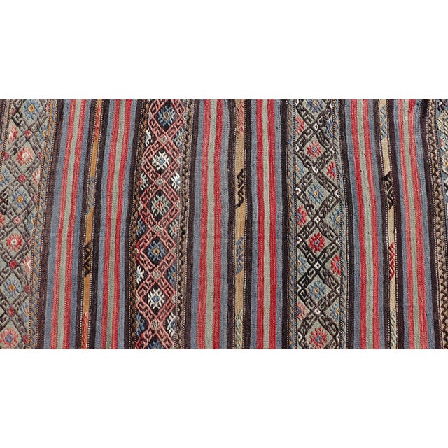 Mid 20th Century Vintage Turkish Kilim With Horizontal Stripes and Tribal Motifs in Bright Tones For Sale - Image 10 of 12