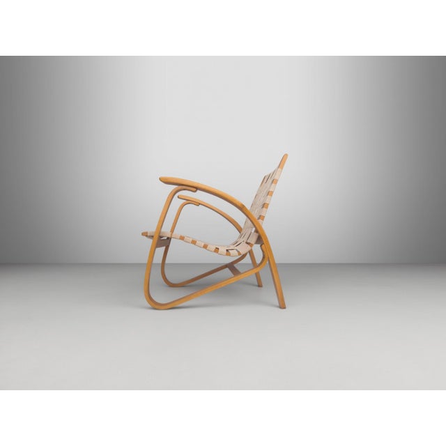 Elegant and highly sculptural bentwood lounge chair designed by Jan Vaněk in Czechoslovakia during the 1930s. The chair...