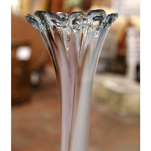 Graceful and sculptural, this tall vintage art glass vase makes a striking decorative statement with or without flowers....