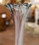 Graceful and sculptural, this tall vintage art glass vase makes a striking decorative statement with or without flowers....