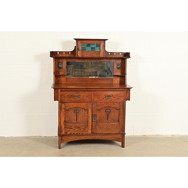 A gorgeous antique Mission, Arts & Crafts, or Art Nouveau period sideboard, buffet server, or bar cabinet Attributed to...