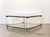 1970s coffee table, brass and plexiglas structure, 2 glass tops, a similar but smaller table is available if desired...