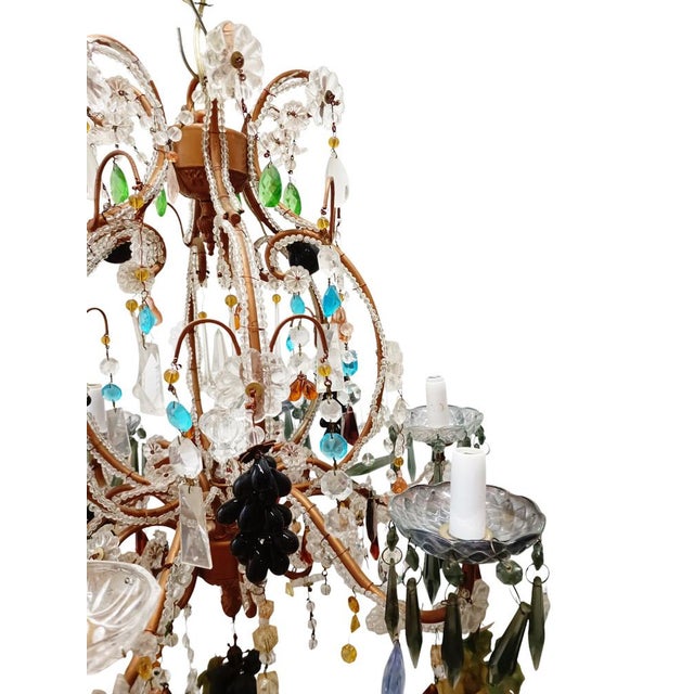 Almost a thousand colored Murano crystals! Only 4 clusters are acrylic, old originals of the lamp. I have official proof...