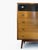 A well-proportioned and characterful example of mid-century British domestic furniture, this five-drawer tallboy was...