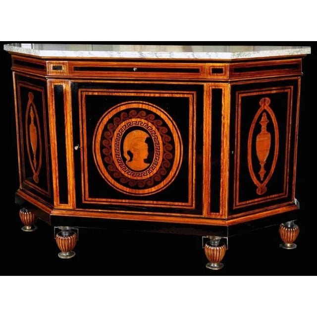 A curious French early 20th century sideboard signed E. Duru with three doors. White and green veined marble-top. Neo...