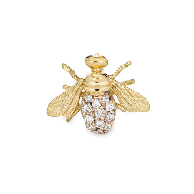 Finely detailed vintage diamond bumble bee brooch, crafted in 14 karat yellow gold. Round brilliant cut diamonds total an...
