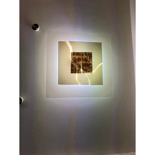 This pair of wall sconces is made out of fused art glass in the style of Toni Zuccheri who first designed them for Venini...