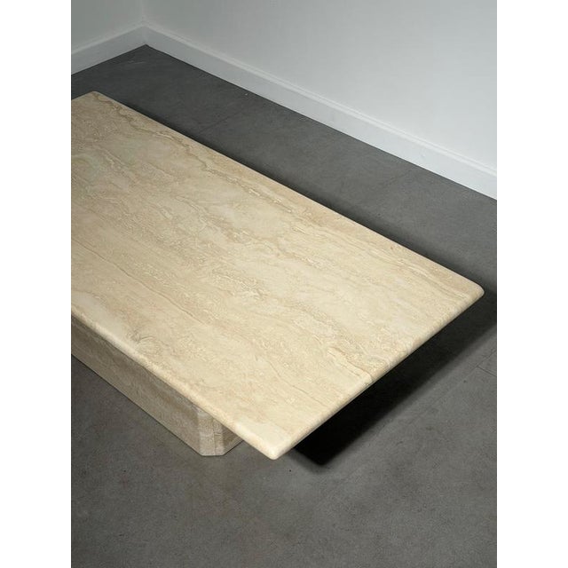 Elegant vintage coffee table crafted entirely from beautiful natural travertine stone. Featuring a thick rectangular top...